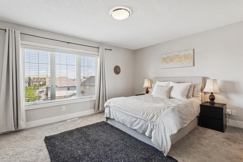 6 Quarry Lane Se, Calgary, AB - Indoor Photo Showing Bedroom