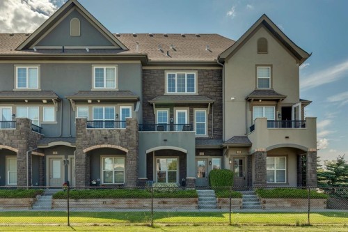 6 Quarry Lane Se, Calgary, AB - Outdoor With Facade