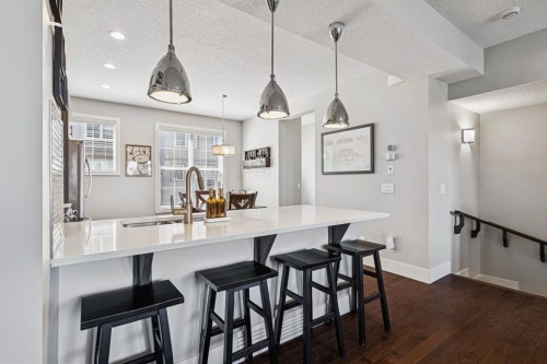 6 Quarry Lane Se, Calgary, AB - Indoor Photo Showing Kitchen With Upgraded Kitchen