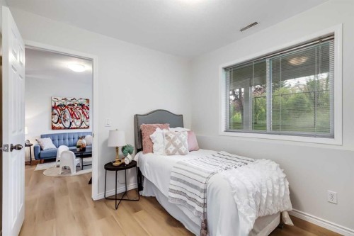 155 Prominence Heights Sw, Calgary, AB - Indoor Photo Showing Bedroom