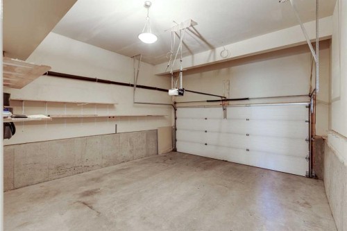 155 Prominence Heights Sw, Calgary, AB - Indoor Photo Showing Garage