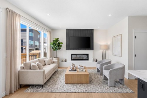 63 Annette Rise Nw, Calgary, AB - Indoor Photo Showing Living Room With Fireplace