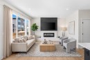 63 Annette Rise Nw, Calgary, AB  - Indoor Photo Showing Living Room With Fireplace 