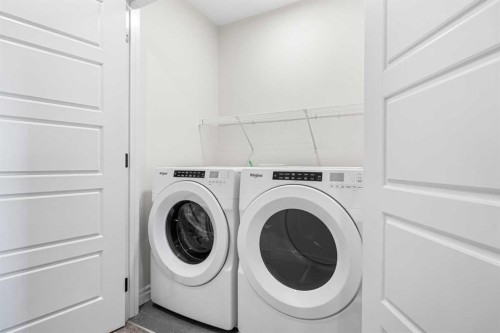 63 Annette Rise Nw, Calgary, AB - Indoor Photo Showing Laundry Room