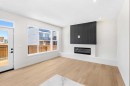63 Annette Rise Nw, Calgary, AB  - Indoor Photo Showing Other Room With Fireplace 