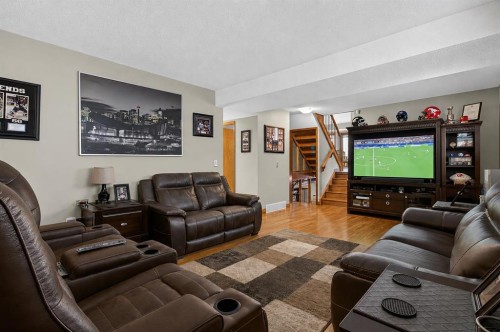8 Erin Meadow Way Se, Calgary, AB - Indoor Photo Showing Living Room