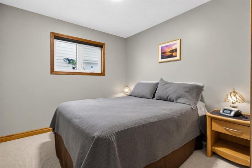 8 Erin Meadow Way Se, Calgary, AB - Indoor Photo Showing Bedroom