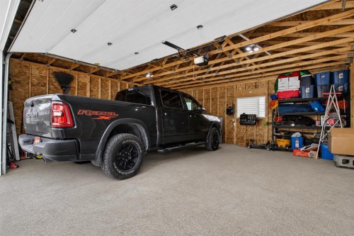 8 Erin Meadow Way Se, Calgary, AB - Indoor Photo Showing Garage