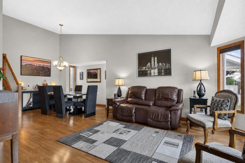 8 Erin Meadow Way Se, Calgary, AB - Indoor Photo Showing Living Room