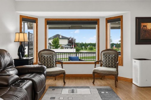 8 Erin Meadow Way Se, Calgary, AB - Indoor Photo Showing Living Room