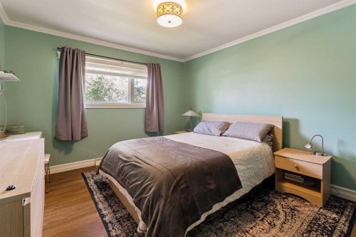 5919 Thornton Road Nw, Calgary, AB - Indoor Photo Showing Bedroom