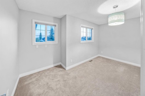 255 Gleneagles View, Cochrane, AB - Indoor Photo Showing Other Room