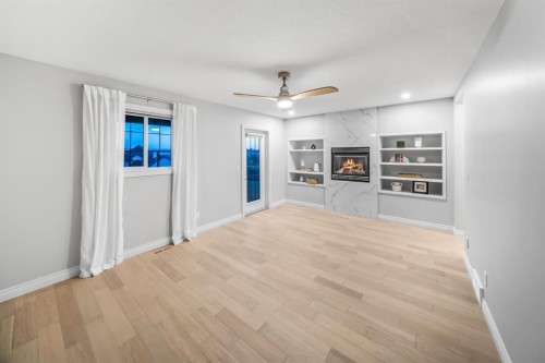 255 Gleneagles View, Cochrane, AB - Indoor Photo Showing Other Room