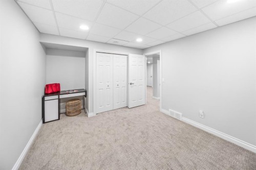 255 Gleneagles View, Cochrane, AB - Indoor Photo Showing Other Room