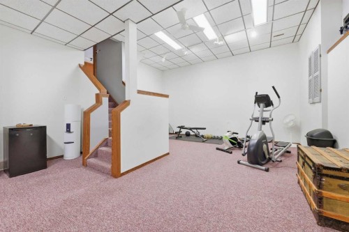149 Edgehill Drive Nw, Calgary, AB - Indoor Photo Showing Gym Room