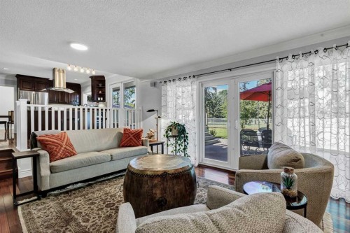10907 Willowfern Drive Se, Calgary, AB - Indoor Photo Showing Living Room