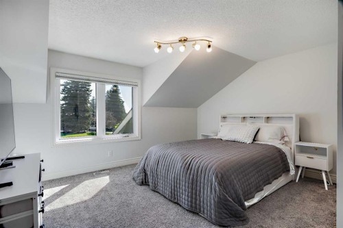 10907 Willowfern Drive Se, Calgary, AB - Indoor Photo Showing Bedroom