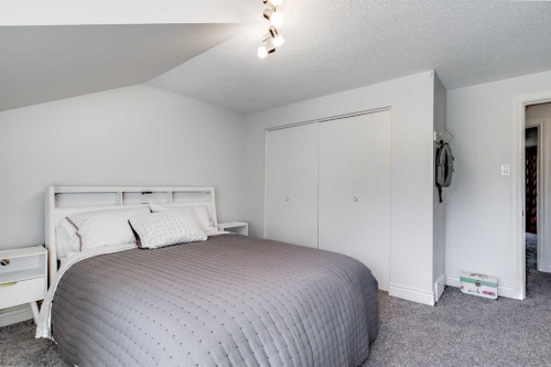 10907 Willowfern Drive Se, Calgary, AB - Indoor Photo Showing Bedroom