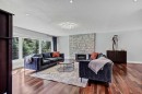 10907 Willowfern Drive Se, Calgary, AB  - Indoor Photo Showing Living Room With Fireplace 