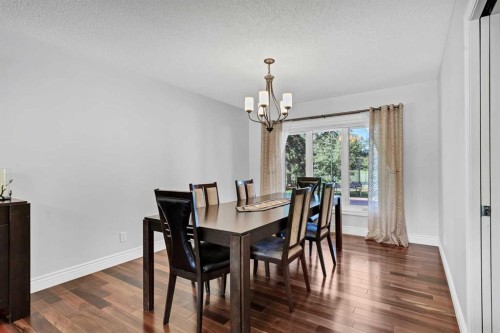 10907 Willowfern Drive Se, Calgary, AB - Indoor Photo Showing Dining Room