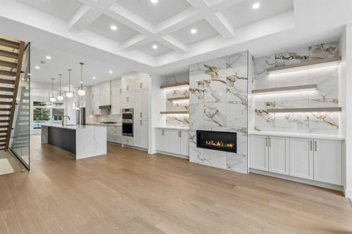 1812 19 Avenue Nw, Calgary, AB - Indoor Photo Showing Kitchen With Fireplace With Upgraded Kitchen