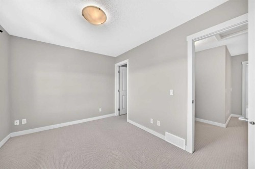 57 Aspen Hills Common Sw, Calgary, AB - Indoor Photo Showing Other Room