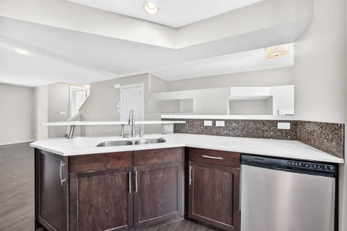 57 Aspen Hills Common Sw, Calgary, AB - Indoor Photo Showing Kitchen With Double Sink