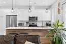 33-230 Seton Passage Se, Calgary, AB  - Indoor Photo Showing Kitchen With Stainless Steel Kitchen With Upgraded Kitchen 