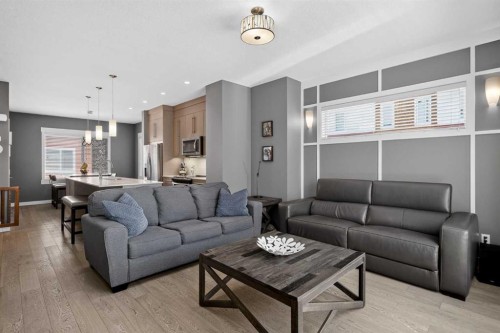 18-111 Rainbow Falls Gate, Chestermere, AB - Indoor Photo Showing Living Room