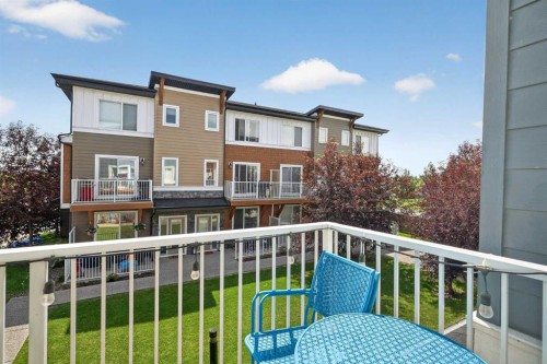 18-111 Rainbow Falls Gate, Chestermere, AB - Outdoor With Balcony With Exterior