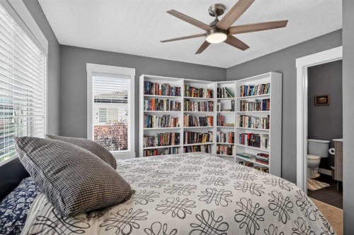 18-111 Rainbow Falls Gate, Chestermere, AB - Indoor Photo Showing Bedroom