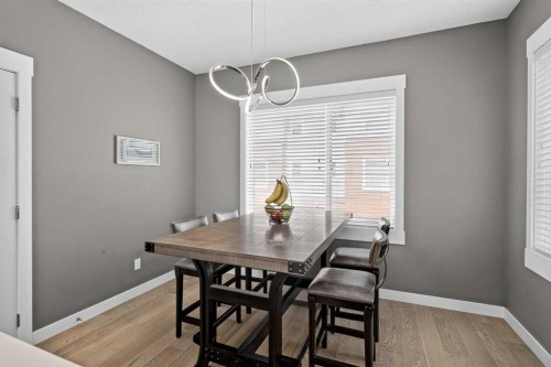 18-111 Rainbow Falls Gate, Chestermere, AB - Indoor Photo Showing Dining Room