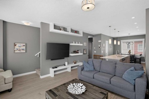 18-111 Rainbow Falls Gate, Chestermere, AB - Indoor Photo Showing Living Room