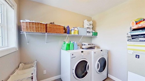 31 Ravenslea Crescent Se, Airdrie, AB - Indoor Photo Showing Laundry Room