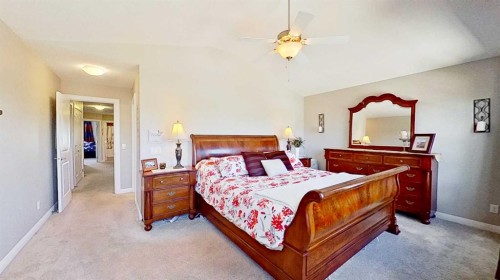 31 Ravenslea Crescent Se, Airdrie, AB - Indoor Photo Showing Bedroom