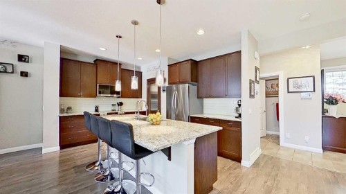 31 Ravenslea Crescent Se, Airdrie, AB - Indoor Photo Showing Kitchen With Upgraded Kitchen