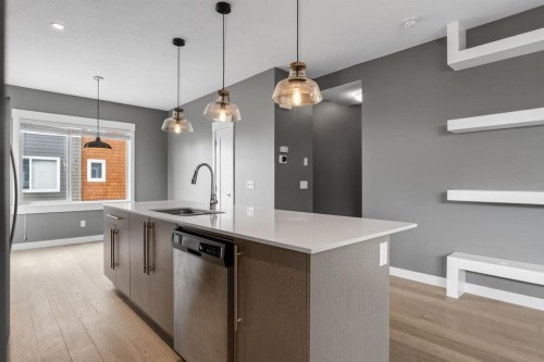 43-111 Rainbow Falls Gate, Chestermere, AB - Indoor Photo Showing Kitchen With Upgraded Kitchen