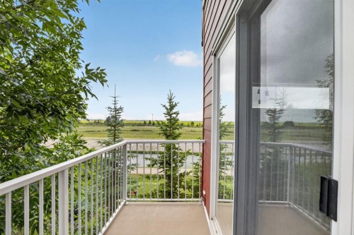 43-111 Rainbow Falls Gate, Chestermere, AB - Outdoor With Balcony With Exterior