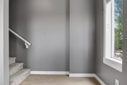 43-111 Rainbow Falls Gate, Chestermere, AB - Indoor Photo Showing Other Room
