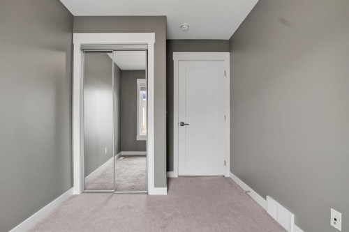 43-111 Rainbow Falls Gate, Chestermere, AB - Indoor Photo Showing Other Room