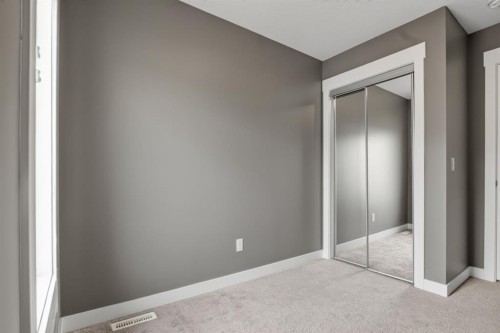 43-111 Rainbow Falls Gate, Chestermere, AB - Indoor Photo Showing Other Room
