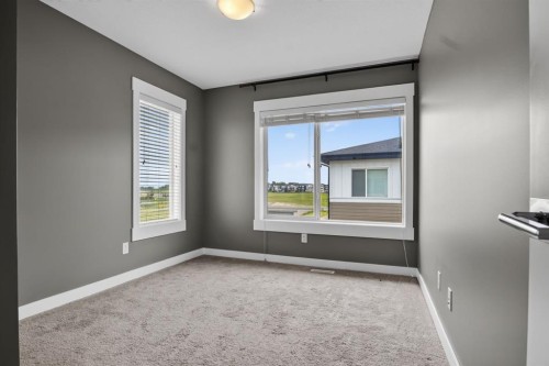 43-111 Rainbow Falls Gate, Chestermere, AB - Indoor Photo Showing Other Room