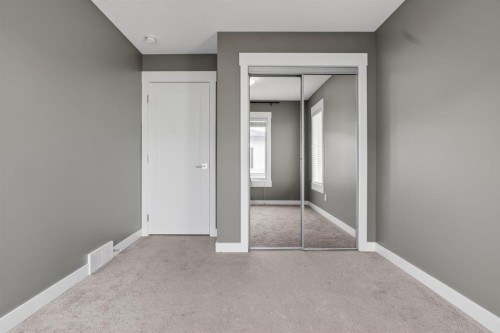 43-111 Rainbow Falls Gate, Chestermere, AB - Indoor Photo Showing Other Room