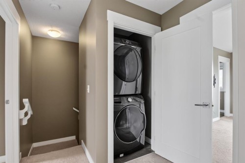 43-111 Rainbow Falls Gate, Chestermere, AB - Indoor Photo Showing Laundry Room