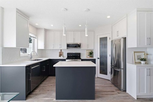 271 Sienna Park View Sw, Calgary, AB - Indoor Photo Showing Kitchen With Stainless Steel Kitchen With Upgraded Kitchen