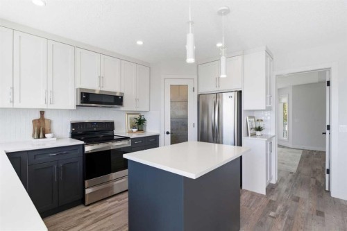 271 Sienna Park View Sw, Calgary, AB - Indoor Photo Showing Kitchen With Stainless Steel Kitchen