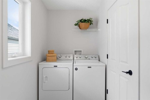 271 Sienna Park View Sw, Calgary, AB - Indoor Photo Showing Laundry Room