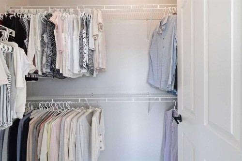 271 Sienna Park View Sw, Calgary, AB - Indoor With Storage