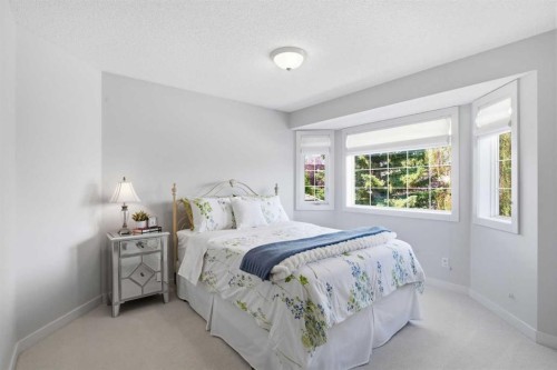 271 Sienna Park View Sw, Calgary, AB - Indoor Photo Showing Bedroom