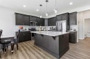 62 Wolf Hollow Way Se, Calgary, AB  - Indoor Photo Showing Kitchen With Stainless Steel Kitchen With Upgraded Kitchen 